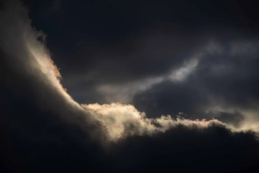 Close-up of a cloud lit up by the sun