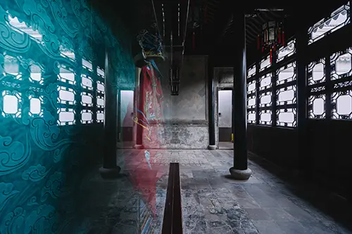 Traditional Chinese clothing inside a glass wall